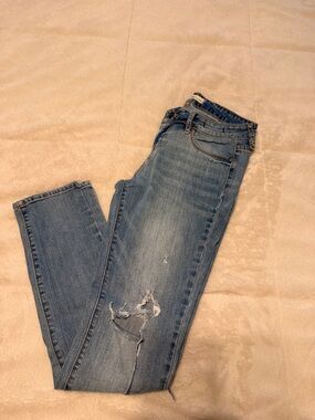 Women’s Blue Distressed Slim Jeans